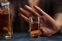 lighthousetreatment-photo-woman-refused-a-glass-of-whiskey-613472678